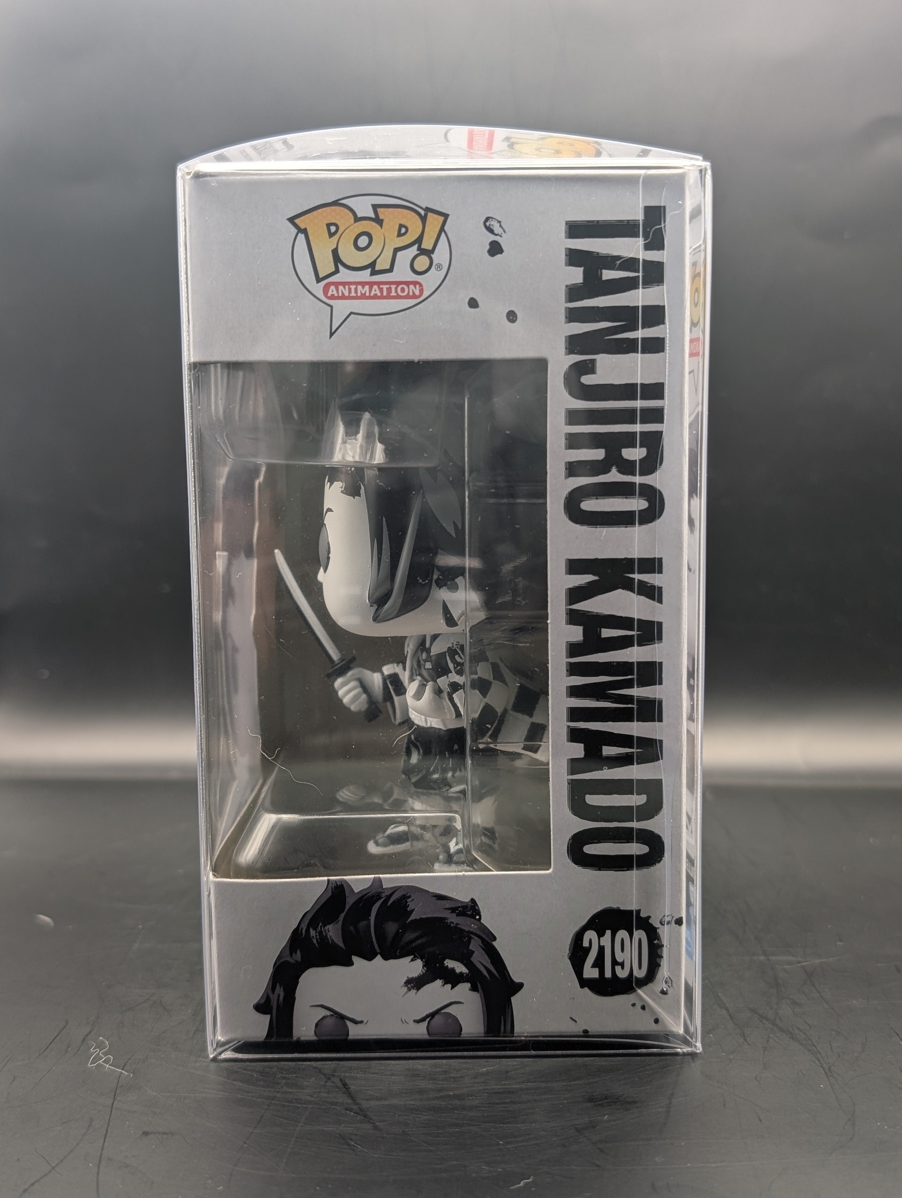 black and white Tanjiro Kamado funko pop